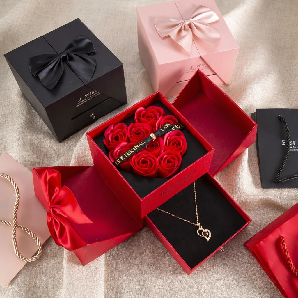 Coffret de roses éternelles rouges avec tiroir contenant un collier. Coffret Roses Éternelles avec Tiroir Surprise